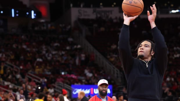 Texans quarterback CJ Stroud throws out the first free throw before the Houston Rockets play the Los Angeles Lakers at Toyota Center.
